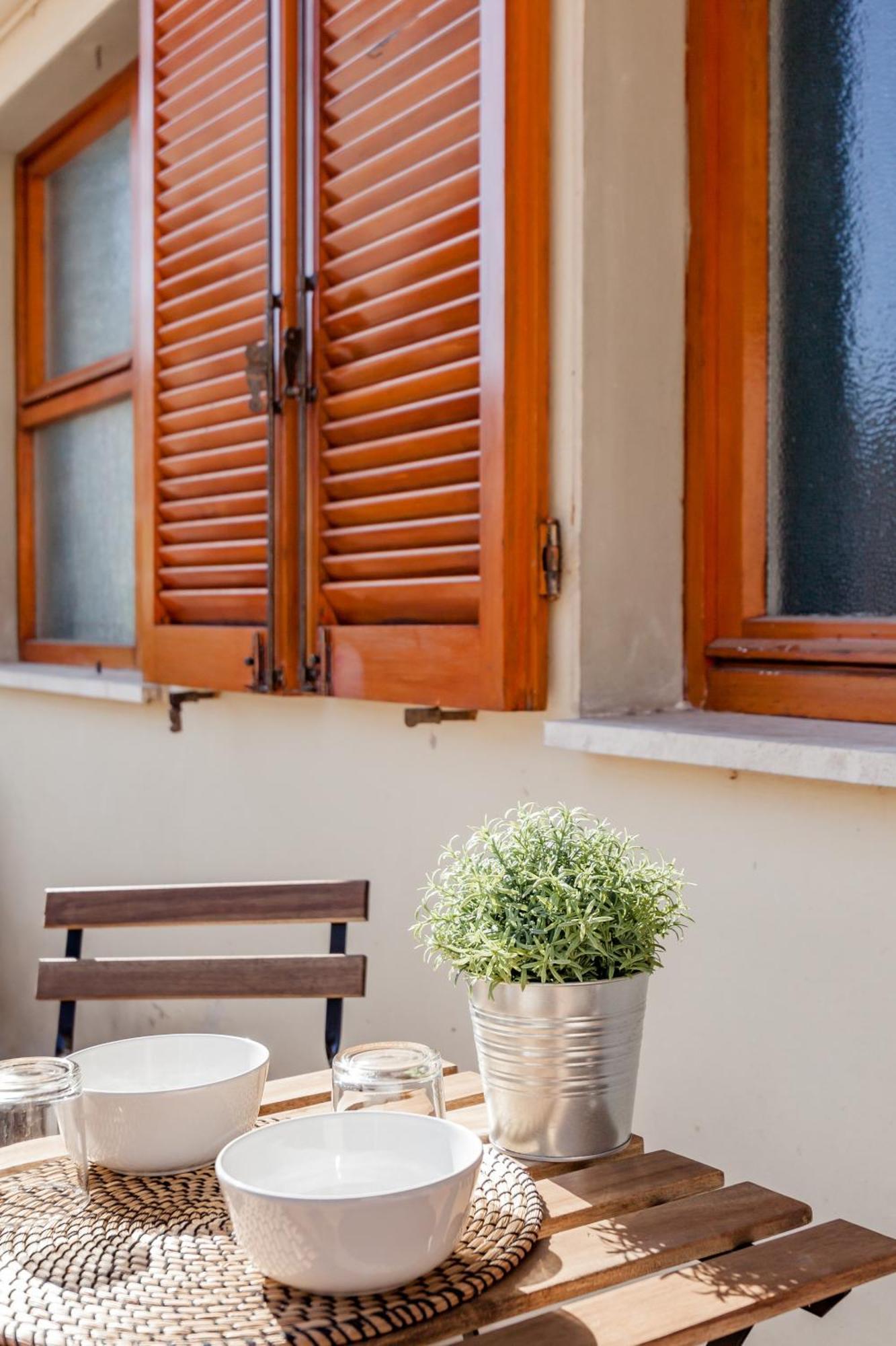 Open The Classic Wooden Shutters At A Cozy Nest Florencia